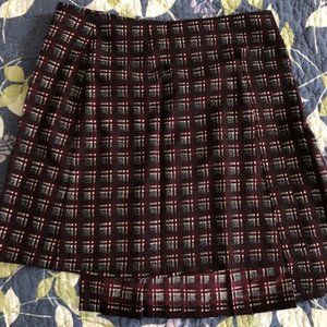 Pleated plaid wallet skirt. Size 4